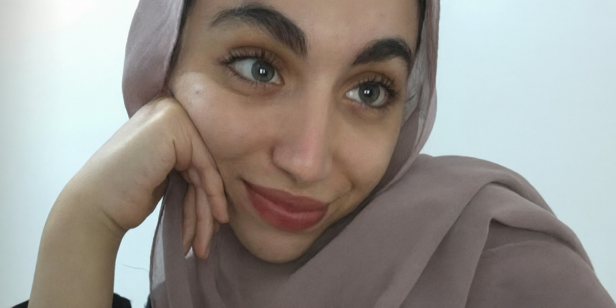 Shot 1 [0-2s]: She removes her hijab, letting it fall away to reveal she is tasteful nude. Shot 2 [2-10s]: A penis ente…